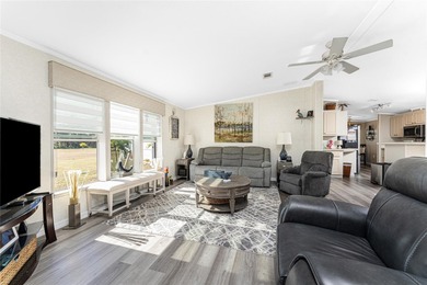 Beautifully Finished Waterfront Home featuring 2 bedrooms and 2 on Kings Gate Golf Club in Florida - for sale on GolfHomes.com, golf home, golf lot