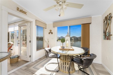 Beautifully Finished Waterfront Home featuring 2 bedrooms and 2 on Kings Gate Golf Club in Florida - for sale on GolfHomes.com, golf home, golf lot