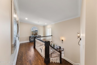 Prepare to be wowed! A must see in person, this custom brick on Members Club At St. James Plantation in North Carolina - for sale on GolfHomes.com, golf home, golf lot