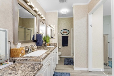 Beautifully Finished Waterfront Home featuring 2 bedrooms and 2 on Kings Gate Golf Club in Florida - for sale on GolfHomes.com, golf home, golf lot