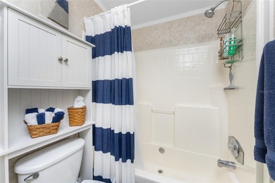 Beautifully Finished Waterfront Home featuring 2 bedrooms and 2 on Kings Gate Golf Club in Florida - for sale on GolfHomes.com, golf home, golf lot