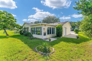 Don't miss this beautifully upgraded 3-bedroom, 2-bath home with on Orange Blossom Hills Golf and Country Club in Florida - for sale on GolfHomes.com, golf home, golf lot