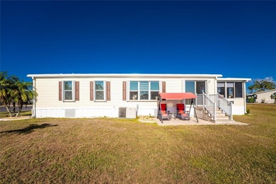 Beautifully Finished Waterfront Home featuring 2 bedrooms and 2 on Kings Gate Golf Club in Florida - for sale on GolfHomes.com, golf home, golf lot