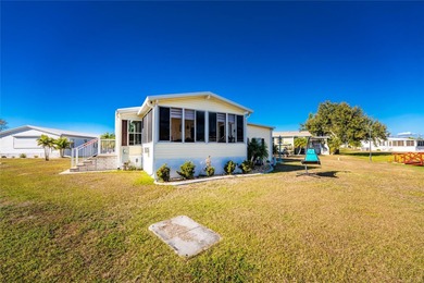 Beautifully Finished Waterfront Home featuring 2 bedrooms and 2 on Kings Gate Golf Club in Florida - for sale on GolfHomes.com, golf home, golf lot