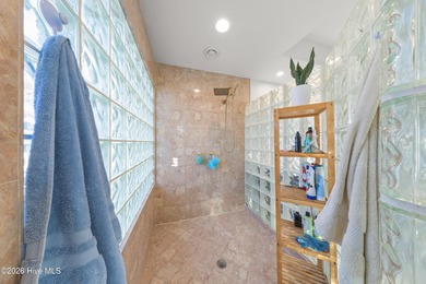 Prepare to be wowed! A must see in person, this custom brick on Members Club At St. James Plantation in North Carolina - for sale on GolfHomes.com, golf home, golf lot