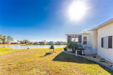 Beautifully Finished Waterfront Home featuring 2 bedrooms and 2 on Kings Gate Golf Club in Florida - for sale on GolfHomes.com, golf home, golf lot