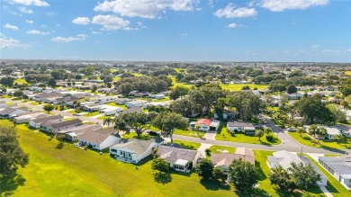Don't miss this beautifully upgraded 3-bedroom, 2-bath home with on Orange Blossom Hills Golf and Country Club in Florida - for sale on GolfHomes.com, golf home, golf lot