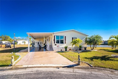 Beautifully Finished Waterfront Home featuring 2 bedrooms and 2 on Kings Gate Golf Club in Florida - for sale on GolfHomes.com, golf home, golf lot