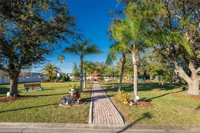 Beautifully Finished Waterfront Home featuring 2 bedrooms and 2 on Kings Gate Golf Club in Florida - for sale on GolfHomes.com, golf home, golf lot