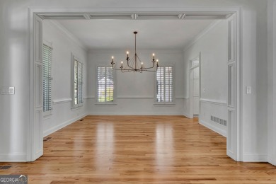 LAKEFRONT LIVING with over 180' of Lake Kedron views and on Canongate At Flat Creek Club in Georgia - for sale on GolfHomes.com, golf home, golf lot