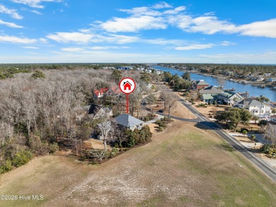 Prepare to be wowed! A must see in person, this custom brick on Members Club At St. James Plantation in North Carolina - for sale on GolfHomes.com, golf home, golf lot