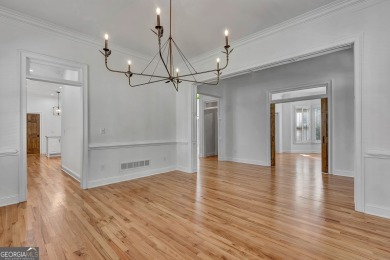 LAKEFRONT LIVING with over 180' of Lake Kedron views and on Canongate At Flat Creek Club in Georgia - for sale on GolfHomes.com, golf home, golf lot