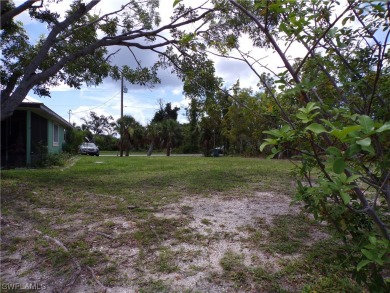 This WATERFRONT lot is on a quiet street that would be a great on Rotonda Golf and Country Club - Long Marsh  in Florida - for sale on GolfHomes.com, golf home, golf lot