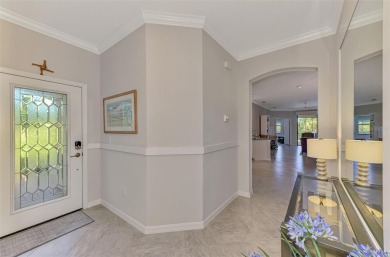 Dramatic price reduction on this gorgeous end unit villa located on Sarasota National Golf Club in Florida - for sale on GolfHomes.com, golf home, golf lot