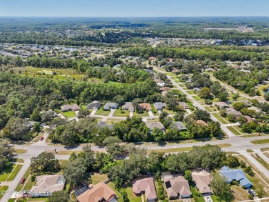 This vacant lot (10,018 sq. ft.) offers the chance to design and on St. Augustine Shores Golf Club in Florida - for sale on GolfHomes.com, golf home, golf lot