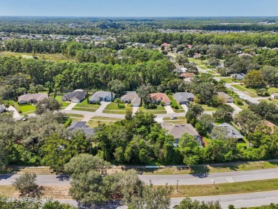 This vacant lot (10,018 sq. ft.) offers the chance to design and on St. Augustine Shores Golf Club in Florida - for sale on GolfHomes.com, golf home, golf lot