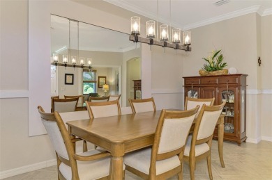 Dramatic price reduction on this gorgeous end unit villa located on Sarasota National Golf Club in Florida - for sale on GolfHomes.com, golf home, golf lot