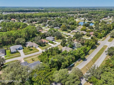 This vacant lot (10,018 sq. ft.) offers the chance to design and on St. Augustine Shores Golf Club in Florida - for sale on GolfHomes.com, golf home, golf lot