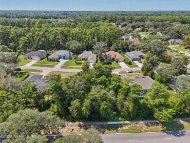 This vacant lot (10,018 sq. ft.) offers the chance to design and on St. Augustine Shores Golf Club in Florida - for sale on GolfHomes.com, golf home, golf lot