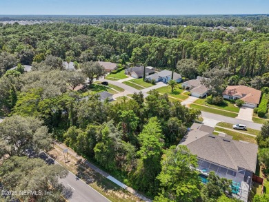 This vacant lot (10,018 sq. ft.) offers the chance to design and on St. Augustine Shores Golf Club in Florida - for sale on GolfHomes.com, golf home, golf lot