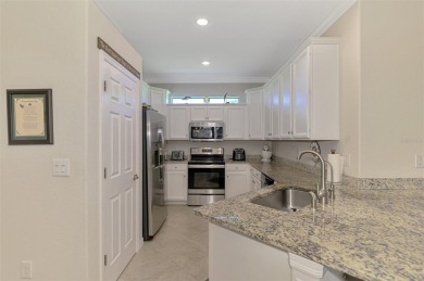 Dramatic price reduction on this gorgeous end unit villa located on Sarasota National Golf Club in Florida - for sale on GolfHomes.com, golf home, golf lot