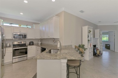 Dramatic price reduction on this gorgeous end unit villa located on Sarasota National Golf Club in Florida - for sale on GolfHomes.com, golf home, golf lot