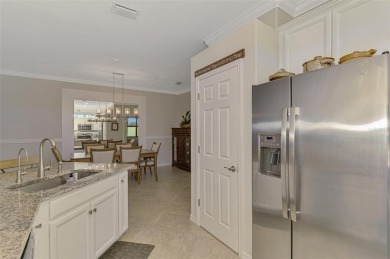 Dramatic price reduction on this gorgeous end unit villa located on Sarasota National Golf Club in Florida - for sale on GolfHomes.com, golf home, golf lot