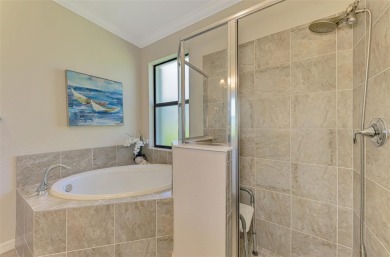 Dramatic price reduction on this gorgeous end unit villa located on Sarasota National Golf Club in Florida - for sale on GolfHomes.com, golf home, golf lot