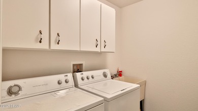 Experience luxury living in Venetian Bay's sought-after Marisol on Venetian Bay Golf Course in Florida - for sale on GolfHomes.com, golf home, golf lot