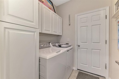 Dramatic price reduction on this gorgeous end unit villa located on Sarasota National Golf Club in Florida - for sale on GolfHomes.com, golf home, golf lot