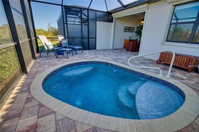 Dramatic price reduction on this gorgeous end unit villa located on Sarasota National Golf Club in Florida - for sale on GolfHomes.com, golf home, golf lot