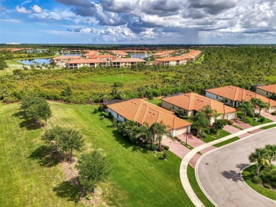 Dramatic price reduction on this gorgeous end unit villa located on Sarasota National Golf Club in Florida - for sale on GolfHomes.com, golf home, golf lot