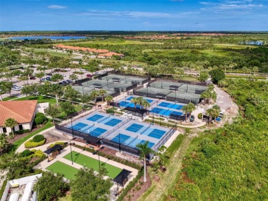 Dramatic price reduction on this gorgeous end unit villa located on Sarasota National Golf Club in Florida - for sale on GolfHomes.com, golf home, golf lot