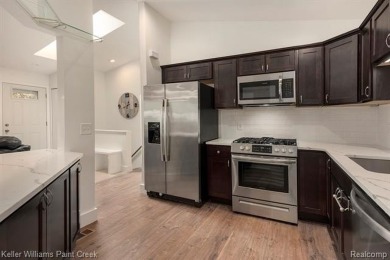 Step into a beautifully updated condo in Clinton Township, where on Fern Hill Country Club in Michigan - for sale on GolfHomes.com, golf home, golf lot