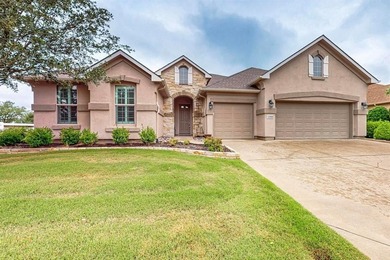 Conveniently located on a corner lot, this Rialta home offers on Wildhorse Golf Club of Robson Ranch in Texas - for sale on GolfHomes.com, golf home, golf lot