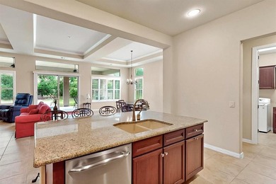 Conveniently located on a corner lot, this Rialta home offers on Wildhorse Golf Club of Robson Ranch in Texas - for sale on GolfHomes.com, golf home, golf lot