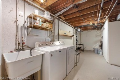 Step into a beautifully updated condo in Clinton Township, where on Fern Hill Country Club in Michigan - for sale on GolfHomes.com, golf home, golf lot