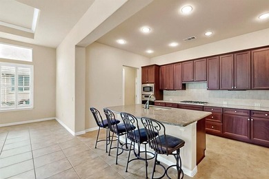 Conveniently located on a corner lot, this Rialta home offers on Wildhorse Golf Club of Robson Ranch in Texas - for sale on GolfHomes.com, golf home, golf lot