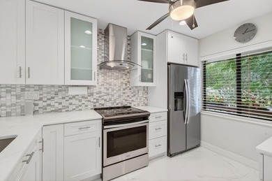 Exclusive Gated 55+ Community | Fully Furnished Corner Unit | on Boca Lago Golf and Country Club in Florida - for sale on GolfHomes.com, golf home, golf lot