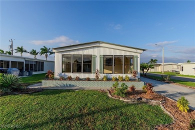 Welcome to this remodeled corner lot home, where modern updates on Six Lakes Country Club in Florida - for sale on GolfHomes.com, golf home, golf lot