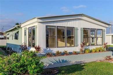 Welcome to this remodeled corner lot home, where modern updates on Six Lakes Country Club in Florida - for sale on GolfHomes.com, golf home, golf lot