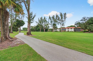 Exclusive Gated 55+ Community | Fully Furnished Corner Unit | on Boca Lago Golf and Country Club in Florida - for sale on GolfHomes.com, golf home, golf lot