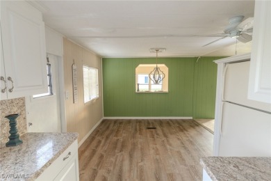 Welcome to this remodeled corner lot home, where modern updates on Six Lakes Country Club in Florida - for sale on GolfHomes.com, golf home, golf lot
