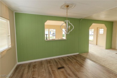 Welcome to this remodeled corner lot home, where modern updates on Six Lakes Country Club in Florida - for sale on GolfHomes.com, golf home, golf lot