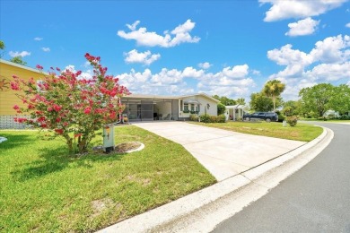 Welcome to this beautifully remodeled 2-bedroom, 2-bathroom home on Orange Blossom Hills Golf and Country Club in Florida - for sale on GolfHomes.com, golf home, golf lot