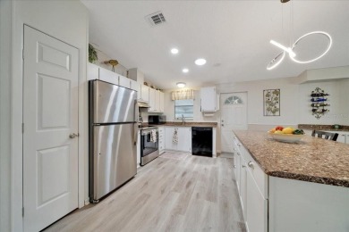 Welcome to this beautifully remodeled 2-bedroom, 2-bathroom home on Orange Blossom Hills Golf and Country Club in Florida - for sale on GolfHomes.com, golf home, golf lot