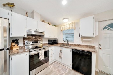 Welcome to this beautifully remodeled 2-bedroom, 2-bathroom home on Orange Blossom Hills Golf and Country Club in Florida - for sale on GolfHomes.com, golf home, golf lot