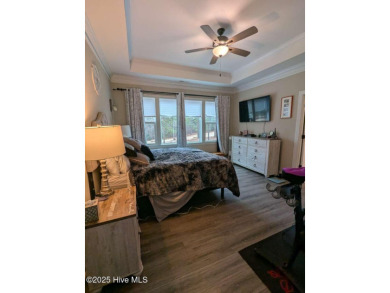 Discover unparalleled golf course living at 120 Devonshire E on Seven Lakes Country Club in North Carolina - for sale on GolfHomes.com, golf home, golf lot