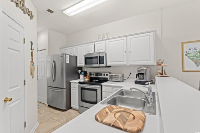 Looking for a condo that's completely move-in ready, beautifully on River Oaks Golf Plantation  in South Carolina - for sale on GolfHomes.com, golf home, golf lot