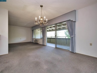 Spacious 2 Bedroom / 1 Bath Condominium located in Rossmoor, an on Rossmoor Golf Course in California - for sale on GolfHomes.com, golf home, golf lot